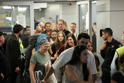 Passengers from flydubai Flight 1073 arriving in Israel on Wednesday evening. Credit: Tomer Applebaum Passengers from flydubai Flight 1073 arriving in Israel on Wednesday evening.