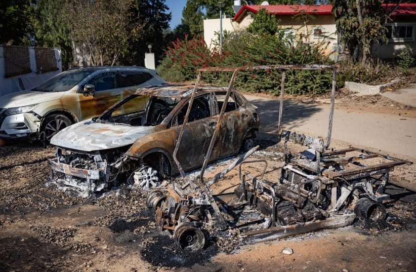 Burned out vehicles on Kibbutz Nahal Oz in the aftermath of Hamas's October 7 massacre; illustrative.