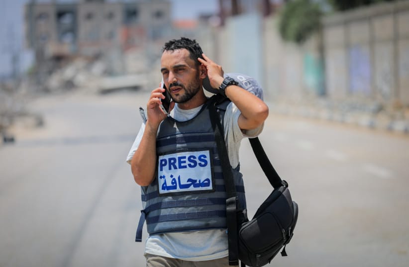 Palestinian journalists report on the war and ongoing humanitarian crisis in the central Gaza Strip, July 26, 2025.