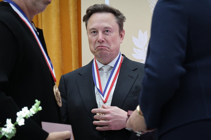 Elon Musk reacts after being awarded a National Medal of Science during the President Donald Trump’s “Golden Age of American Innovation Summit” last week.