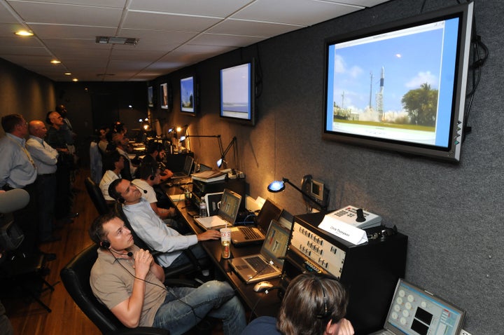 Elon Musk watches the liftoff of Falcon1 rocket from Omelek Island in the Kwajalein Atoll, 2,500 miles southwest of Hawaii, in September 2008. Falcon 1 was the first privately developed liquid fuel rocket to orbit Earth. 