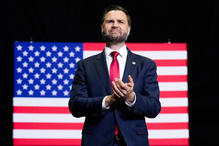 MONROE, MICHIGAN - OCTOBER 15: US Vice President JD Vance applauds as he takes the stage during a midterm campaign rally at the LevelUp Training Complex on October 15, 2026 in Monroe, Michigan. (Photo by Daniel Heuer-Pool/Getty Images)