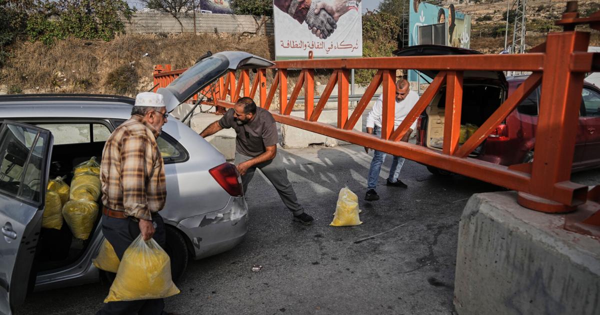 Israel imposes closures across a West Bank city after attacks, and other Mideast news