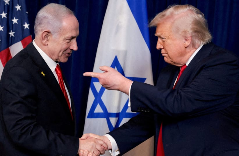 US President Donald Trump points his finger towards Israeli Prime Minister Benjamin Netanyahu as they shake hands during a press conference after meeting at Trump’s Mar-a-Lago club in Palm Beach, Florida.
