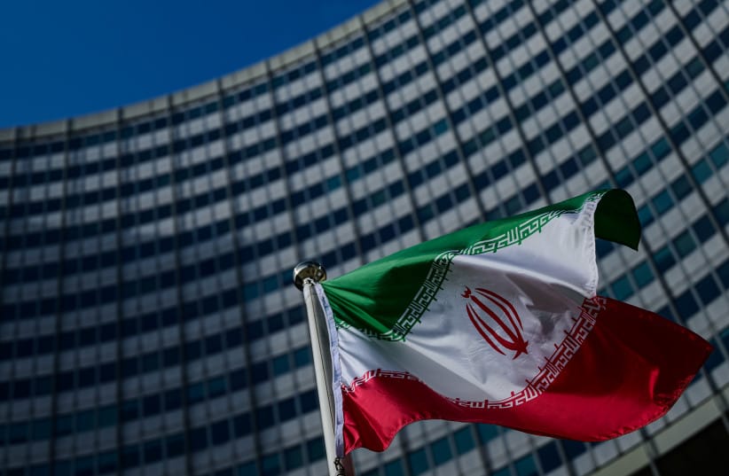 The flag of Iran is seen outside the International Atomic Energy Agency (IAEA) headquarters during a meeting of the IAEA Board of Governors on March 02, 2026 in Vienna, Austria;illustrative