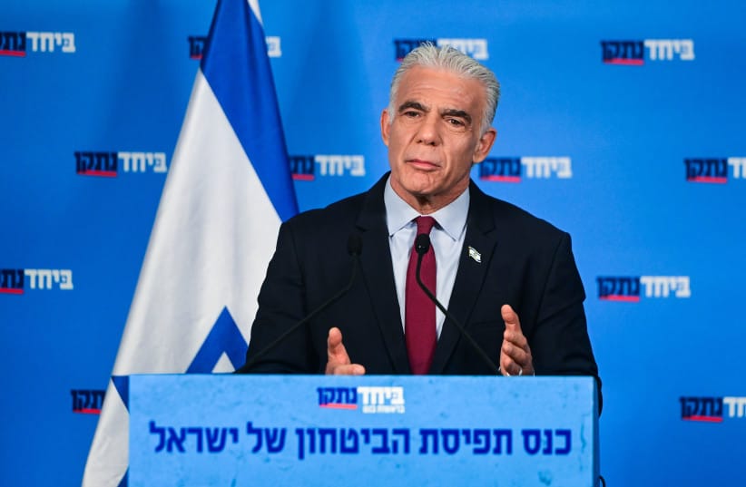 Opposition Leader Yair Lapid speaks during a press conference as part of the B'Yachad party election campaign in Tel Aviv, central Israel, August 19, 2026.