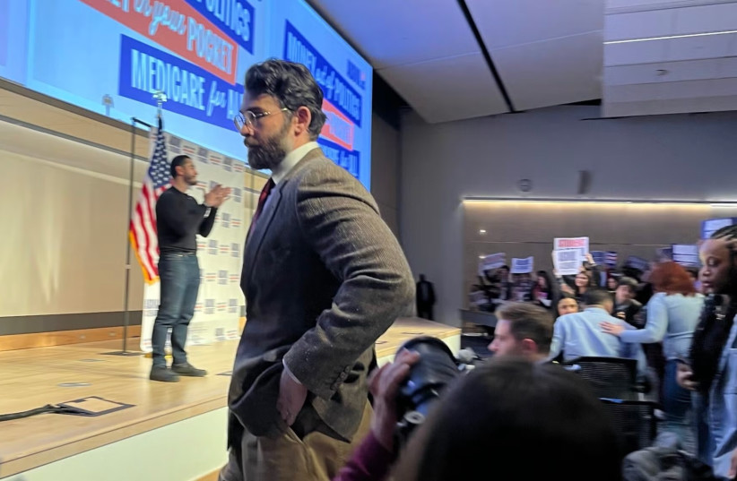 Hasan Piker looks on as US Senate candidate Abdul El-Sayed delivers a stump speech in Ann Arbor, Michigan, April 7, 2026.