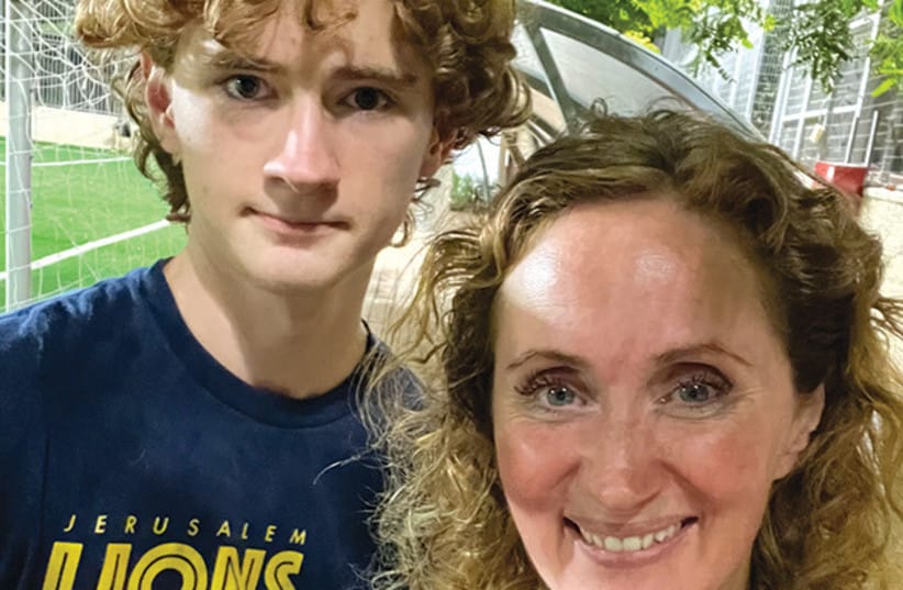 Callie with son, Aviel Mitchell, at a Jerusalem Lions practice.
