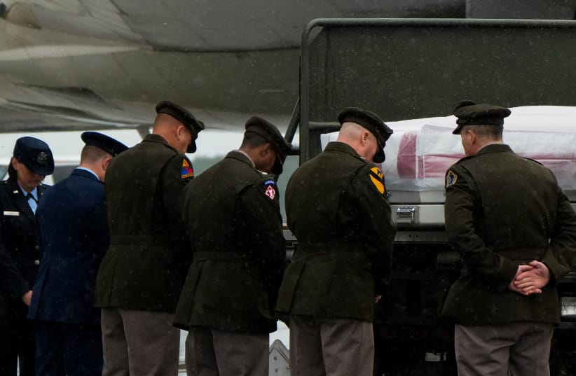 Members of the military bow their heads to the remains of US Army Maj. Bianca Wilkerson, who died in a non-combat related incident while deployed in Doha, Qatar in support of military operations connected to the US-Iran war, during a dignified transfer at Dover Air Force Base in Dover, Delaware. (credit: Elizabeth Franz/Reuters) Members of the military bow their heads to the remains of US Army Maj. Bianca Wilkerson, who died in a non-combat related incident while deployed in Doha, Qatar in support of military operations connected to the US-Iran war, during a dignified transfer at Dover Air Force Base in Dover, Delaware. (credit: Elizabeth Franz/Reuters)