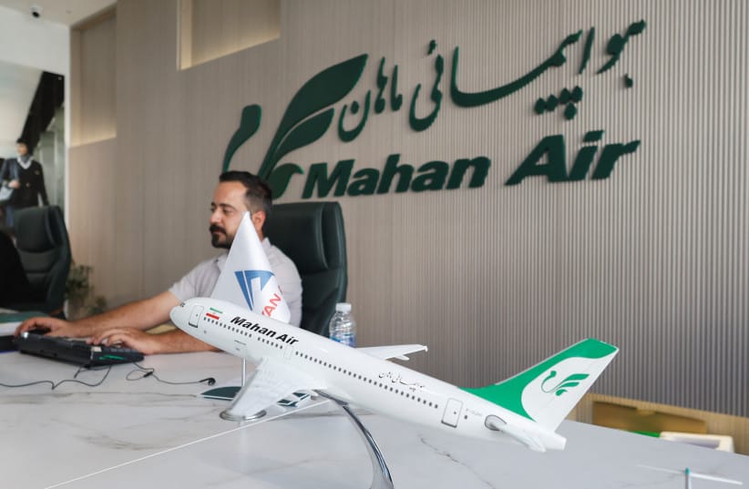 An employee works at the office of Iran's Mahan Air in Erbil, Iraq, September 22, 2026.