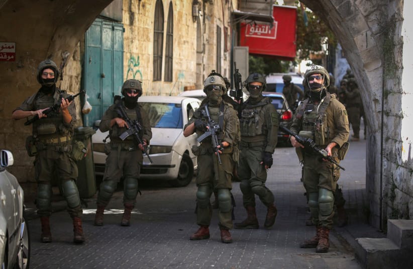 Israeli soldiers take part in a military operation in the market in the Old City of Nablus, in the northern West Bank, September 27, 2026.