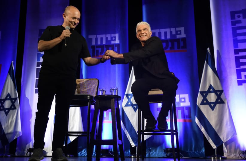 RAMAT HASHARON, ISRAEL - AUGUST 20: Former prime ministers Naftali Bennett and Yair Lapid attend an election campaign event for their joint B’Yachad party on August 20, 2026 in Ramat Hasharon.