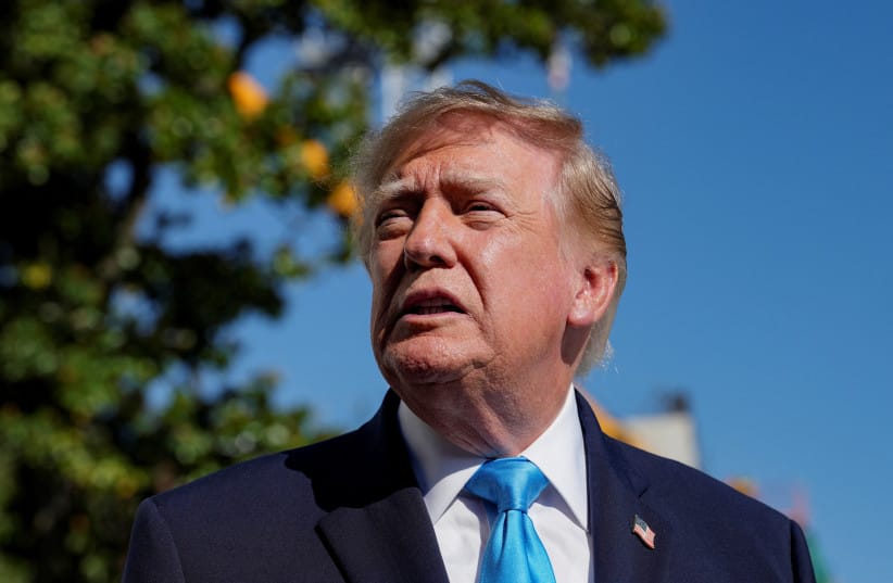 US President Donald Trump speaks with media before boarding Marine One as he travels to Grand Island, Nebraska, on the South Lawn of the White House in Washington, DC, US, October 5, 2026.