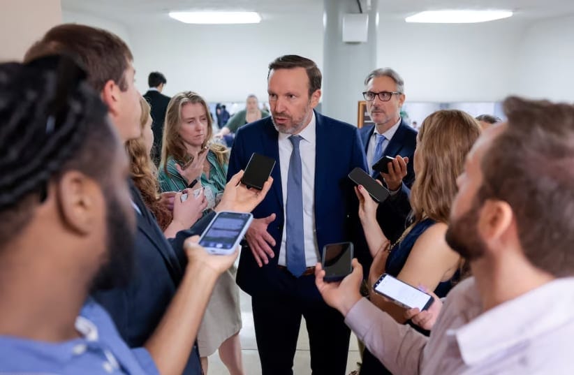 US Senator Chris Murphy (D-CT) speaks with reporters on the way to a vote on the "Stop Insider Trading Act" on Capitol Hill in Washington, DC, US, September 30, 2026.