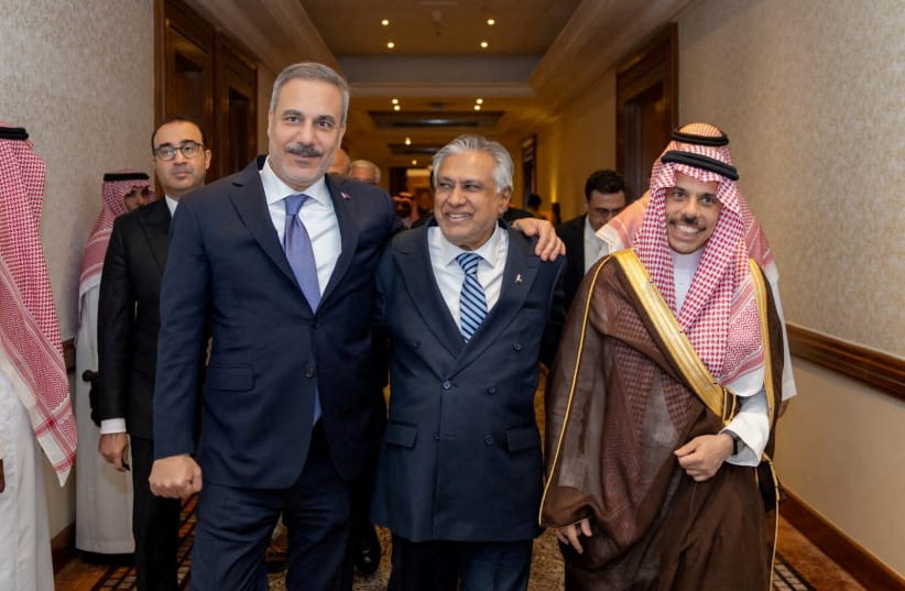 Turkey's Foreign Minister Hakan Fidan, Pakistan's Deputy Prime Minister and Foreign Minister Mohammad Ishaq Dar and Saudi Arabia's Foreign Minister Prince Faisal bin Farhan Al Saud leave after a meeting of the Mecca defence pact in Riyadh, Saudi Arabia, October 5, 2026.