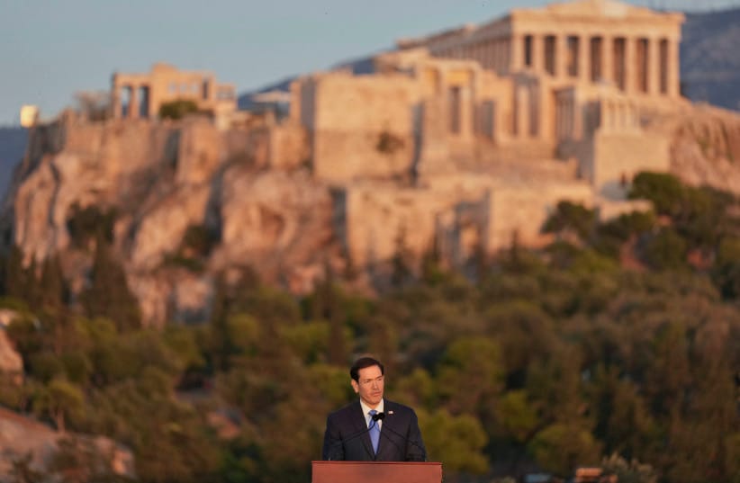 U.S. Secretary of State Marco Rubio speaks at the Pnyx hill, where ancient Athenians held democratic assemblies, with the ancient Parthenon temple atop the Acropolis seen in the background, in Athens on October 7, 2026.