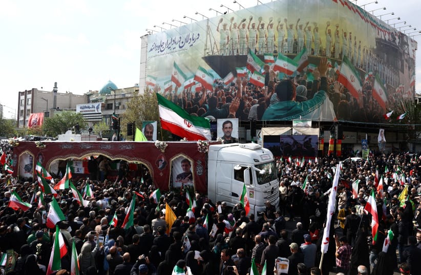 People attend a funeral ceremony for the Revolutionary Guards Navy Commander Alireza Tangsiri, who was killed in strikes, amid the U.S.-Israeli conflict with Iran, in Tehran, Iran, April 1, 2026. (credit: MAJID ASGARIPOUR/WANA