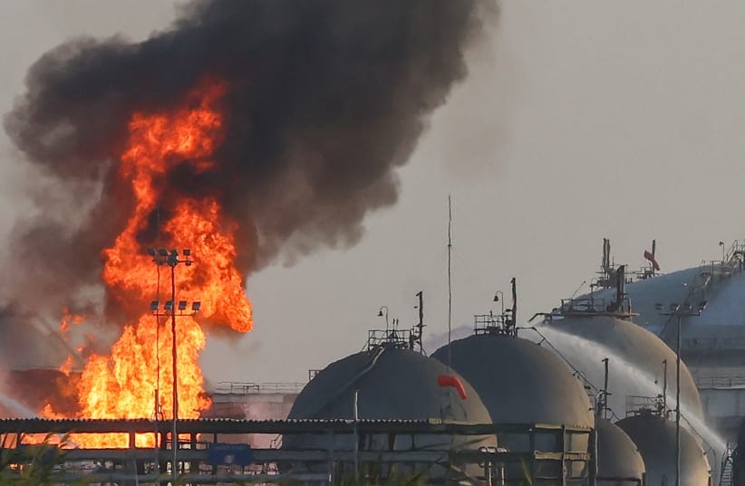 Flames burn at a facility belonging to Saudi oil giant Aramco south of Riyadh on October 3, 2026.