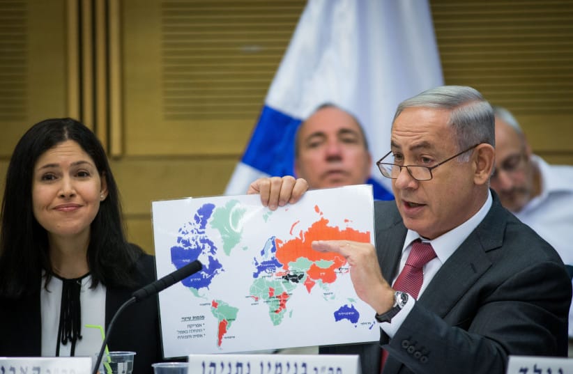 Israeli Prime Minister Benjamin Netanyahu (R) attends a session of the State Control Committee at the Knesset, Israeli parliamant in Jerusalem. on July 25, 2016.