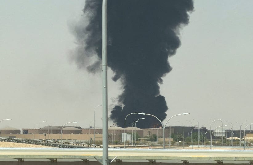 Large plume of black smoke rises from the fuel storage area at King Khalid International Airport, in Riyadh, Saudi Arabia, September 19, 2026. Picture taken with a mobile phone.