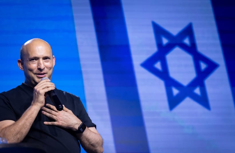 Naftali Bennett speaks during a press conference in Tel Aviv, October 11, 2026.