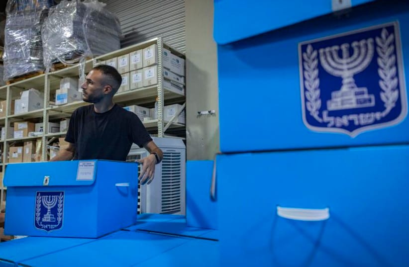 Workers prepare ballot boxes for Israel’s upcoming general elections at the Central Elections Committee warehouse in Shoham, ahead of their distribution to polling stations across the country, October 14, 2026