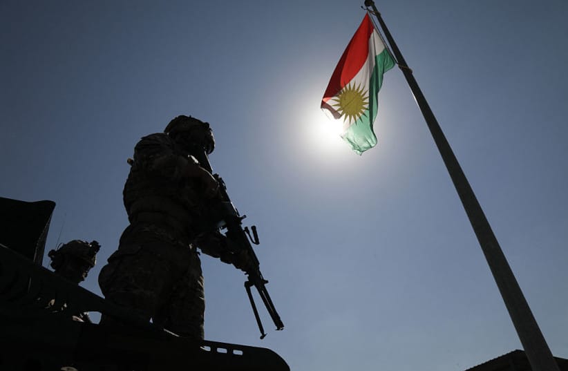 Kurdish Peshmerga fighters take position on the Qarachogh Mountain in the Makhmur district, about 60 kilometres south of Erbil, capital of Iraq's autonomous northern Kurdish region, on September 30, 2026.