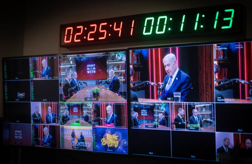 Prime Minister Benjamin Netanyahu is seen being interviewed by the Jerusalem Post's Zvika Klein and Amichai Stein in the early hours of October 21, 2026.