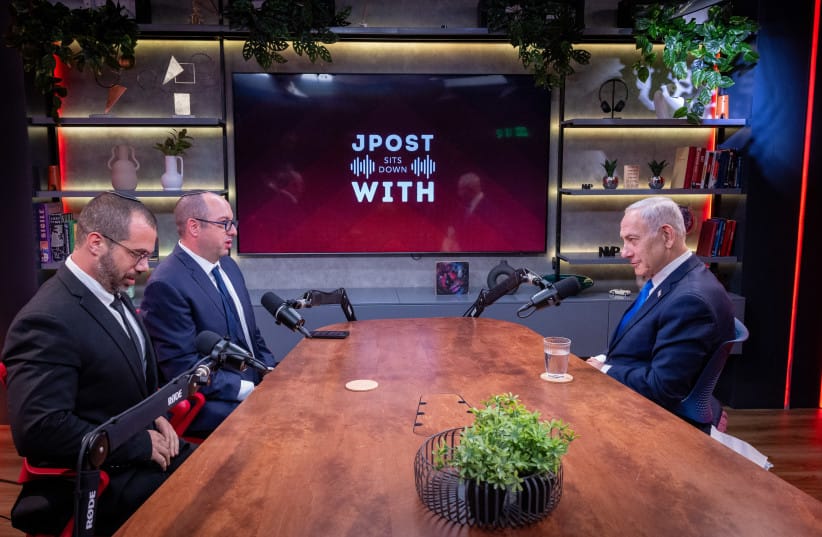 WRITERS ZVIKA KLEIN (C) and Amichai Stein interview Benjamin Netanyahu.