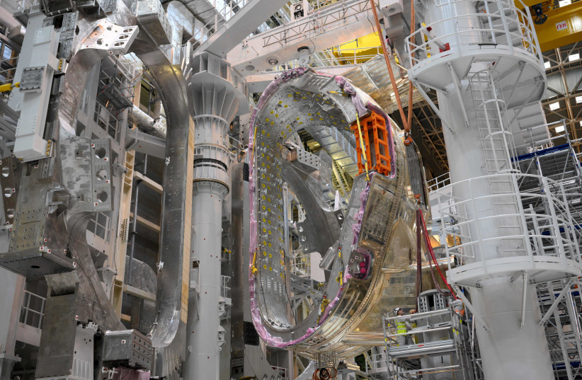 FRANCE-NUCLEAR-ELECTRICITY-SCIENCE-TECHNOLOGY-ITER Engineers work on a module being assembled at the international nuclear fusion project Iter in Saint-Paul-les-Durance, southern France, on January 5, 2023.