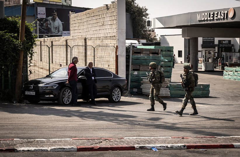 soldiers patrol at the northern checkpoint in Hebron, in the occupied West Bank, on October 24, 2026.