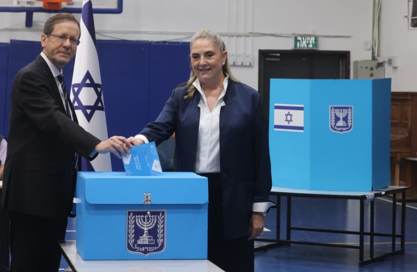 President Isaac Herzog casts his ballot in the 26th Knesset election in Jerusalem.