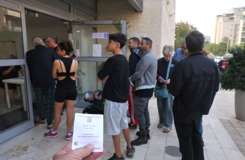 Israelis wait in line to vote in the 26th Knesset elections, October 27, 2026.