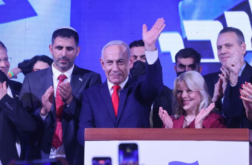 Prime Minister Benjamin Netanyahu speaks at Likud headquarters following the release of exit polls.