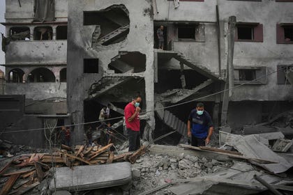 A heavily damaged building in central Gaza on Sunday. As evidence mounted of possible war crimes by Israel, Pillay's reports became increasingly harsh. Credit: Abdel Kareem Hana/AP A heavily damaged building in central Gaza on Sunday. As evidence mounted of possible war crimes by Israel, Pillay's reports became increasingly harsh.