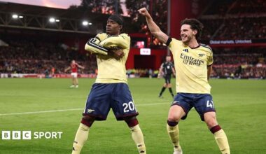 Noni Madueke celebrates with Declan Rice.