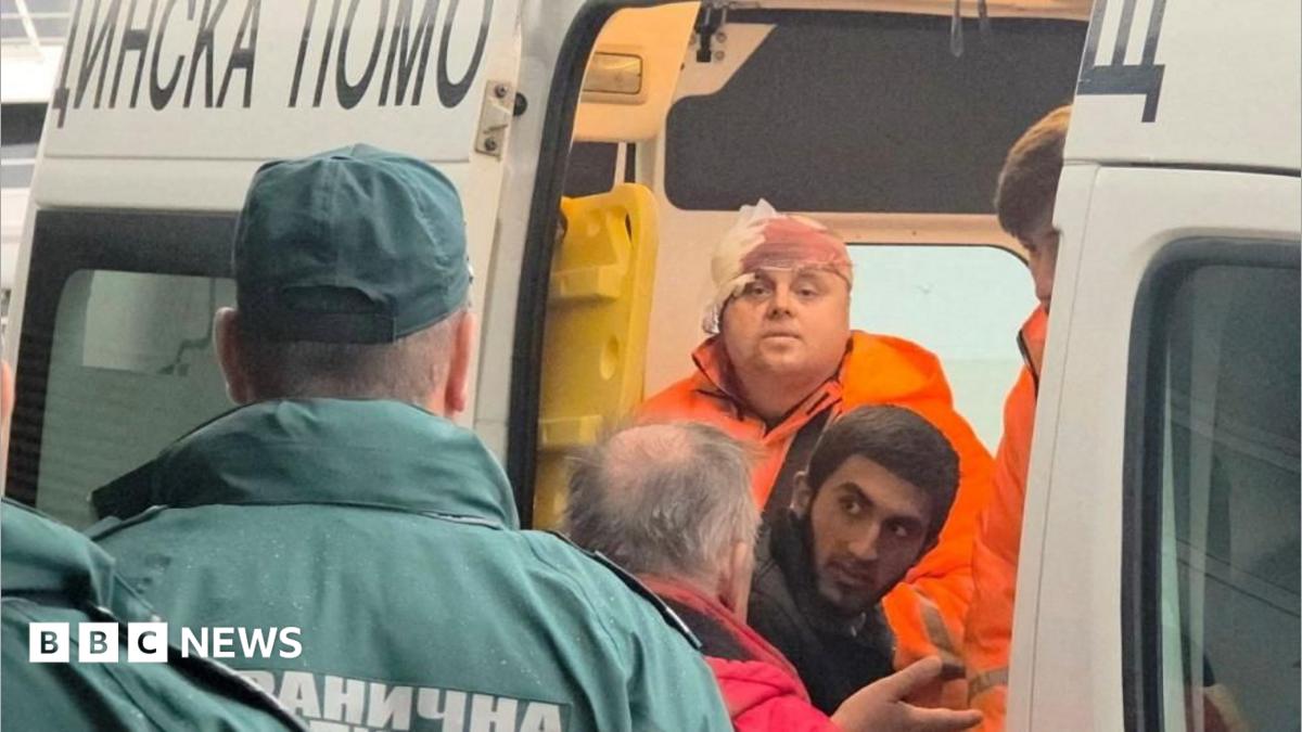 Rescued crew members from a ship that was damaged in drone attack are taken away in an ambulance in Varna, Bulgaria, October 13, 2026.