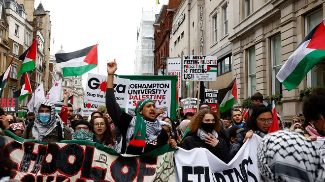 London, UK. April 27, 2023. Student protesters seen gesturing at an anti-Israel protest march in London.