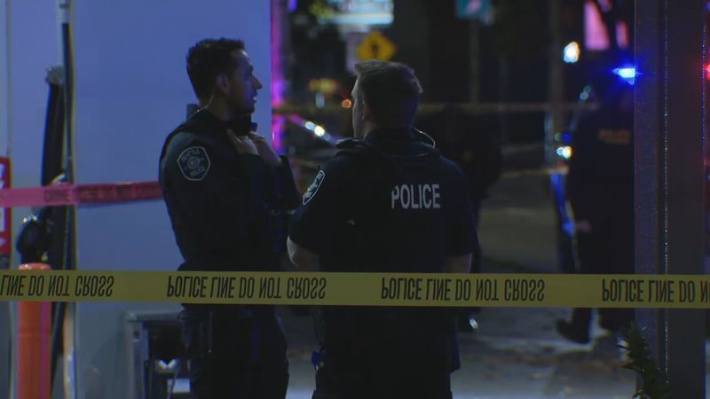 Seattle police officers outside the scene on Oct. 13, 2026. (KOMO)