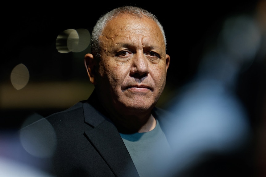 Gadi Eisenkot wearing a grey shirt and dark jacket. 