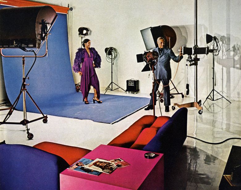 Former Ebony staff photographer Isaac Sutton with the model Charmayne Caldwell in JPC's in-house photo studio in1972.