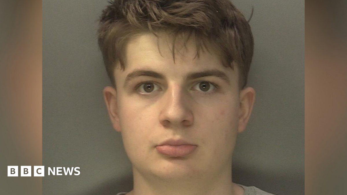 A mugshot of Benjamin Day looking at the camera. He has brown eyes and brown hair.