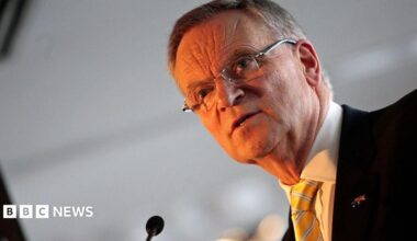 Jeffrey Archer is photographed while making a speech