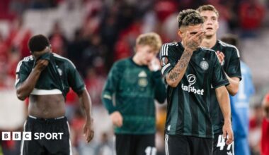 Celtic players look dejected after defeat by Benfica