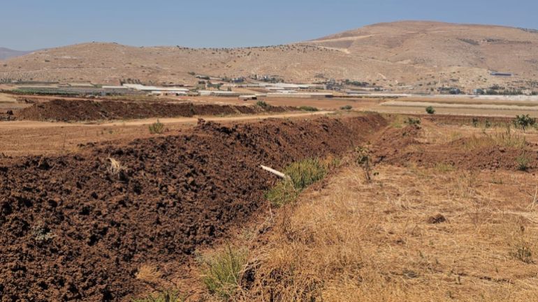 A trench dug by Israel around the Bedouin community to besiege the residents and restrict their movement.