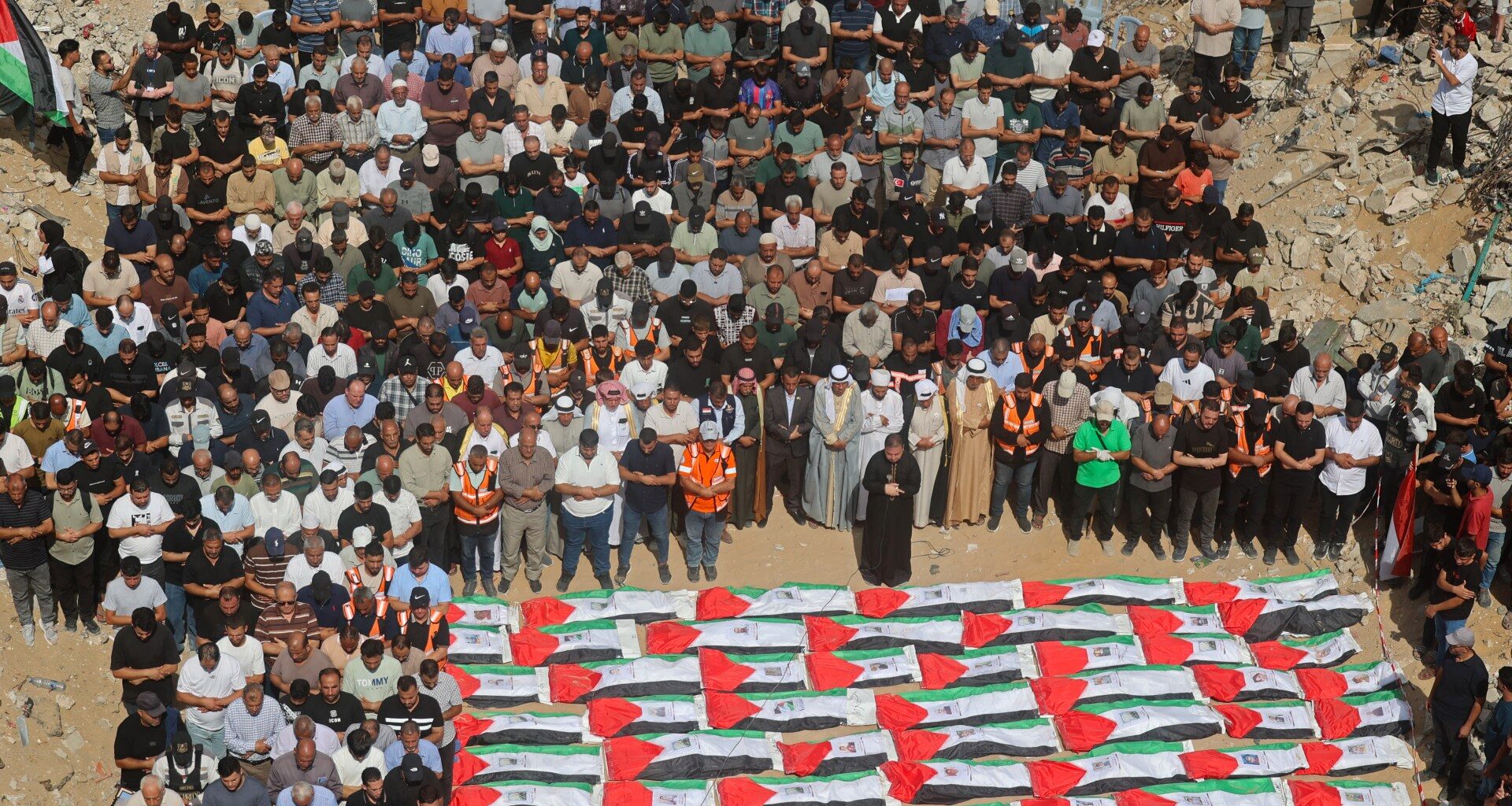 Palestinians bury remains of 105 people killed in Israeli attack on Gaza | Conflict News