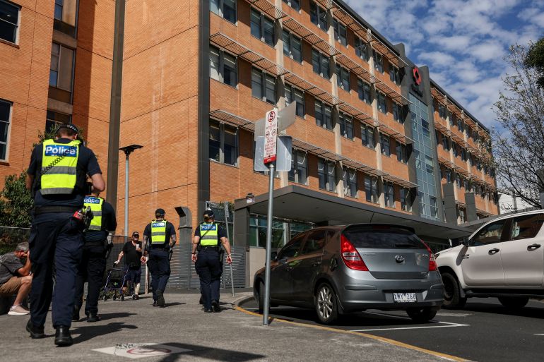 Police arrive at Alfred Hospital where Australian politician Helen Haines is being treated in Melbourne on October 20, 2026 [Martin Keep/AFP]