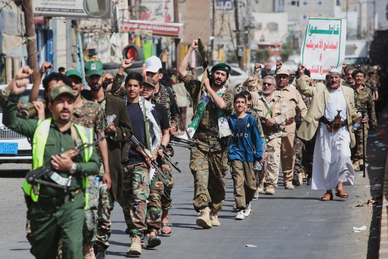 Yemen's Houthi rebels march during a mobilization campaign in Sanaa, Yemen, Thursday, Sept. 10, 2026. Placard in Arabic reads "boycott American and Israeli goods". (AP