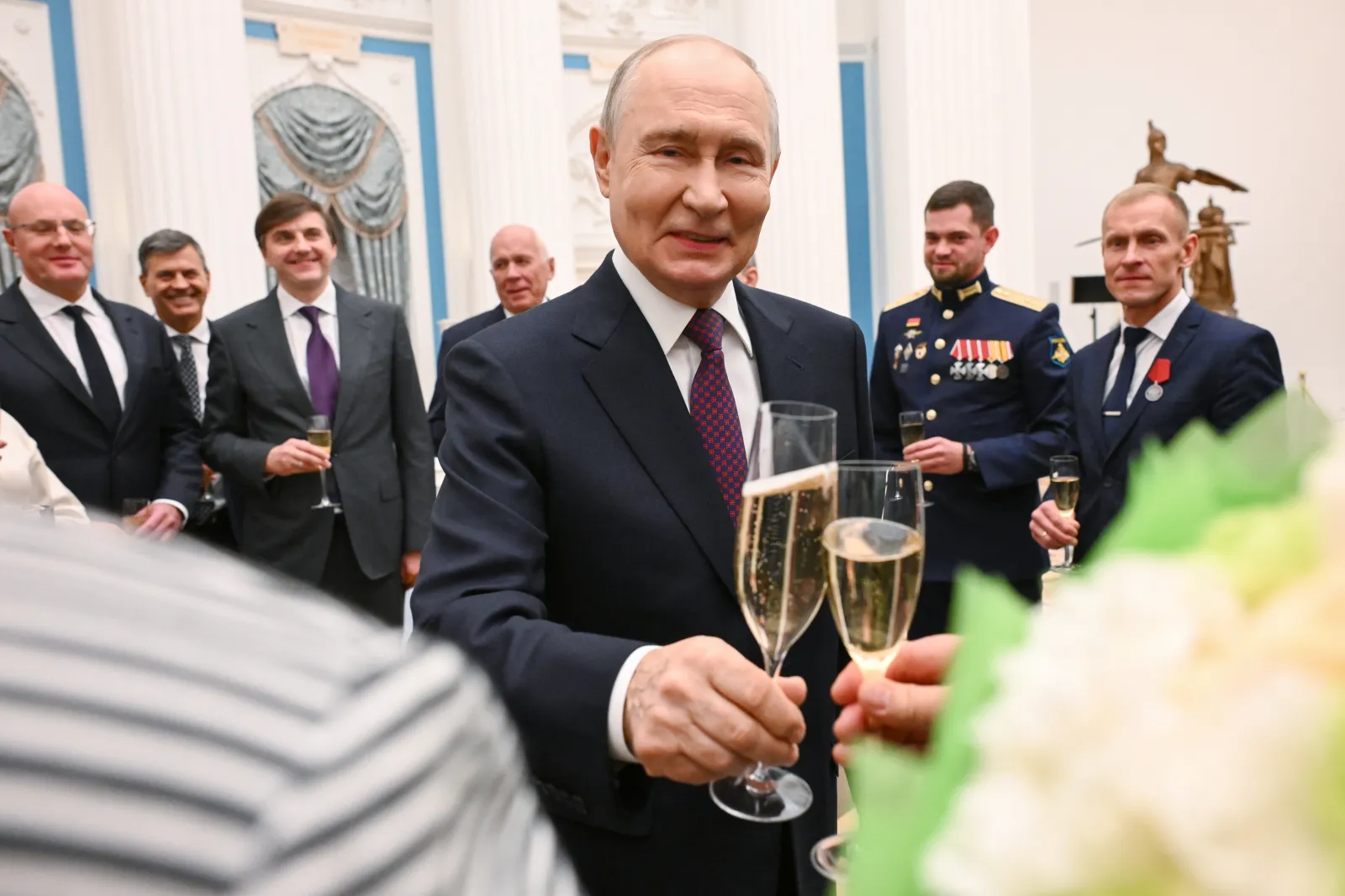 Russian President Vladimir Putin presents awards to teachers of participants in Russia's special military operation at the Kremlin in Moscow, Russia, on October 5