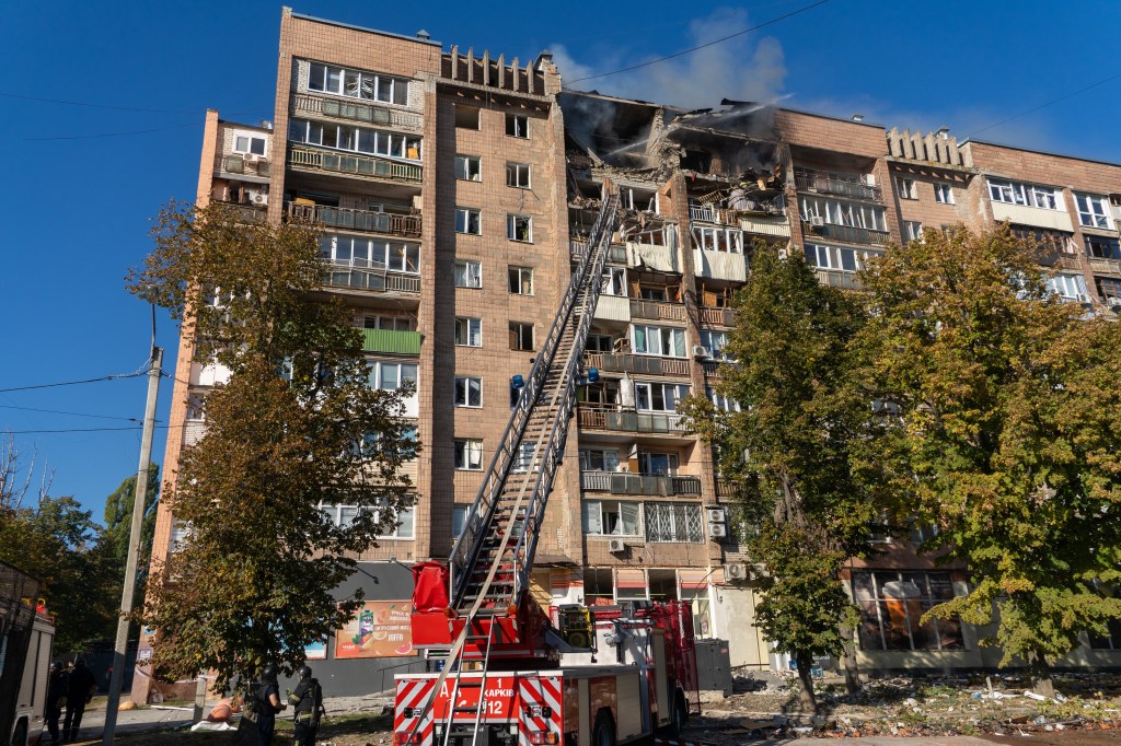 A residential building burns following a Russian air attack in Kharkiv, Ukraine, Monday, Oct. 12, 2026. (AP Photo/Andrii Marienko)

